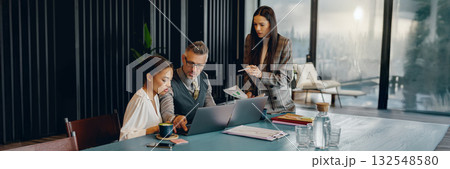 Join our Collaborative Business Meeting in a modern office, enhancing creativity and interaction 132548580