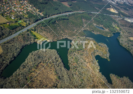 Scenic aerial view of Etang d'Yrieux and nearby landscapes in Ondres 132550072