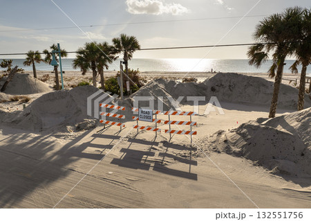 Piles of garbage from severely damaged homes after hurricane Milton storm surge in Florida. Debris on street side on Manasota Key in Englewood. Hurricane aftermath cleanup 132551756