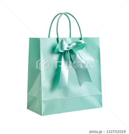 Isolated mint paper bag decorated with satin ribbon on white background 132552029