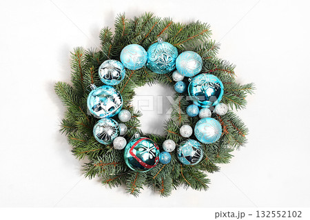 Christmas wreath made of live fir branches, toys and decorations, design template, Christmas composition and New Year 2026 concept, Beautiful holiday decoration, winter banner screen, 132552102