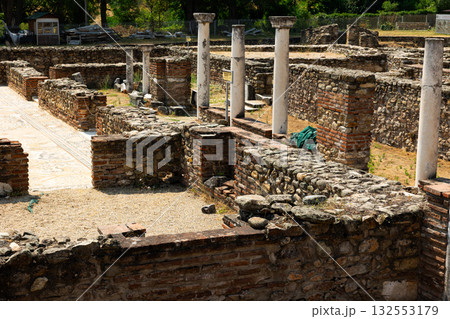 Sunlit stone ruins of Heraclea Lyncestis near Bitola, North Macedonia 132553179