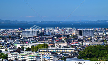 大村市(長崎県／新大村駅建設後)　遠景に針尾電波塔と西海橋(佐世保) 132553454