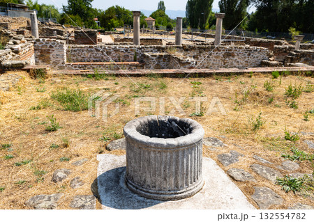 Sunlit stone ruins of Heraclea Lyncestis near Bitola, North Macedonia 132554782