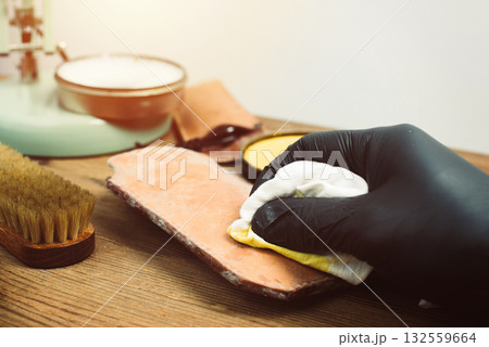 Cleaning the mould on leather product 132559664