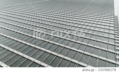 Water buoy platform array for Floating Solar Panel farm. Solar panel PV System in Industry lake 132560179