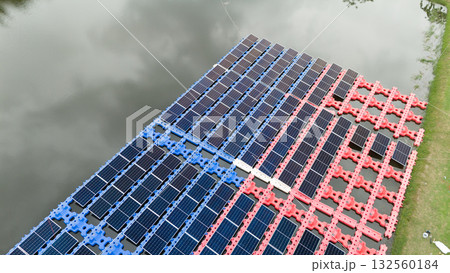 Drone view of Floating Solar Panel. Solar photovoltaic panel PV System in Industry lake water pond 132560184