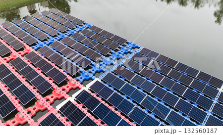 Drone view of Floating Solar Panel. Solar photovoltaic panel PV System in Industry lake water pond 132560187