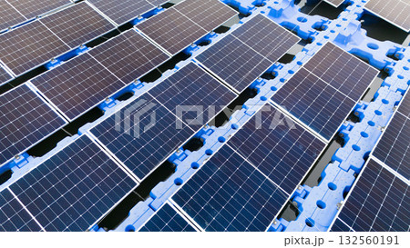 Drone view of Floating Solar Panel. Solar photovoltaic panel PV System in Industry lake water pond 132560191