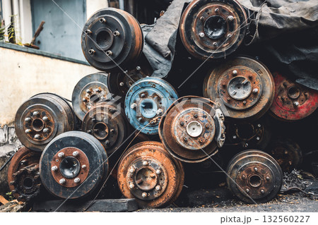 garage scrapyard, old used vehicle spare part engine block car body parts storage for recycle or repair for sale 132560227