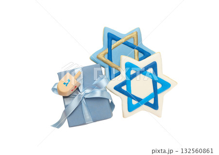 Two blue and white star-shaped cookies next to gift box, isolated, PNG Two blue and white star-shaped cookies next to gift box, isolated, PNG 132560861