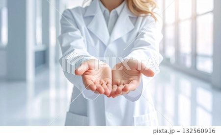 両手を差し出す白衣を着た女性の手　AI生成素材 132560916