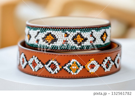 Stylish woman in fluffy blue faux fur coat and sunglasses enjoys coffee at outdoor cafe with a moody ambiance Stylish woman in fluffy blue faux fur coat and sunglasses enjoys coffee at outdoor cafe with a moody ambiance 132561782