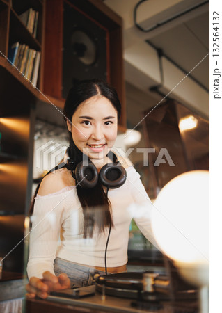 DJ Asian women young teen with music player, party sound entertainment happy smiling expression 132564132
