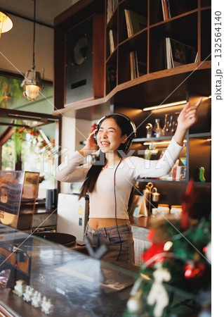 DJ Asian women young teen with music player, party sound entertainment happy smiling expression 132564140