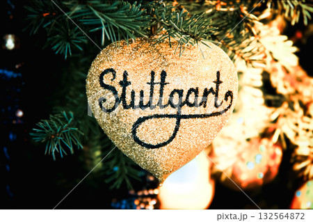 Golden heart on Christmas tree 132564872