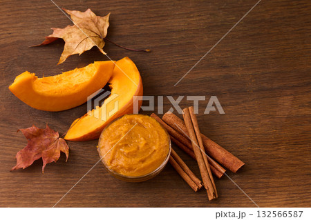 Autumn Pumpkin Spice butter. A cozy autumn composition with pumpkin, cinnamon sticks, 132566587