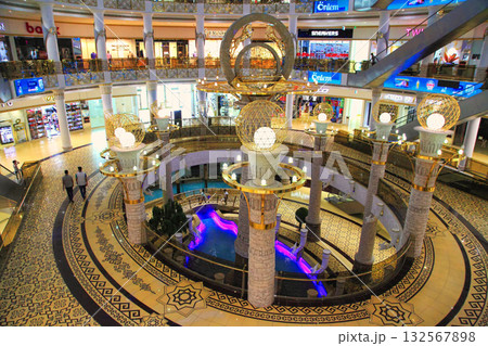 Ashgabat, Turkmenistan. May 02, 2021: New shopping mall "Berkarar". Modern retail shopping mall with upscale stores in an Ashgabat city. Ashgabat, Turkmenistan. May 02, 2021: New shopping mall "Berkarar". Modern retail shopping mall with upscale stores in an Ashgabat city. 132567898