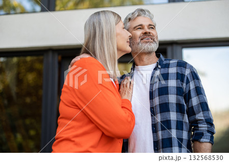 Mature couple feeling happy and smiling nicely 132568530