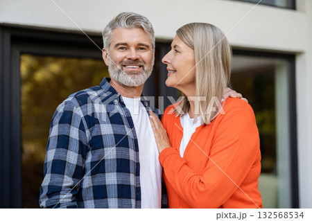 Mature couple feeling happy and smiling nicely 132568534
