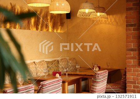 A Cozy Restaurant Interior Featuring Elegant...の写真素材 [132571911] - PIXTA