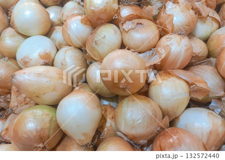 Young bulb onions in peel Young bulb onions in peel 132572440