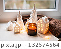 Cozy Christmas Village Miniatures With Candlelight And Warm Home Decor Scene 132574564