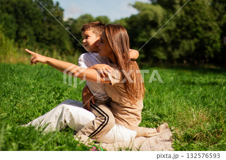 Caucasian millennial mother playing with son. Parenting topics. Happy family concept. Caucasian millennial mother playing with son. Parenting topics. Happy family concept. 132576593