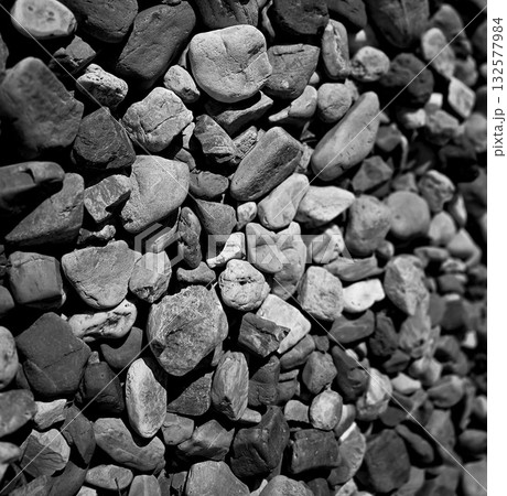 texture of a natural assortment of pebbles and river stones in warm earth tones, ideal for landscaping, garden borders, pathways, or decorative rock surfaces texture of a natural assortment of pebbles and river stones in warm earth tones, ideal for landscaping, garden borders, pathways, or decorative rock surfaces 132577984