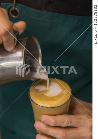 Barista preparing latte coffee Barista preparing latte coffee 132578182