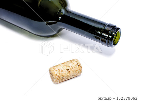 Wine bottle and cork isolated on a white Wine bottle and cork isolated on a white 132579062