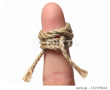the string tied on the index finger 132579818