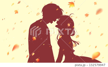 向かい合って笑い合う男女　秋　紅葉　シルエット 132579947