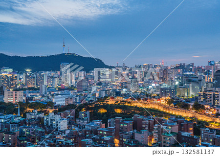 Seoul's Namsan Tower and its surrounding cityscape during the autumn day Seoul's Namsan Tower and its surrounding cityscape during the autumn day 132581137