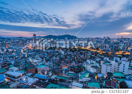 Seoul's Namsan Tower and its surrounding cityscape during the autumn day Seoul's Namsan Tower and its surrounding cityscape during the autumn day 132581187