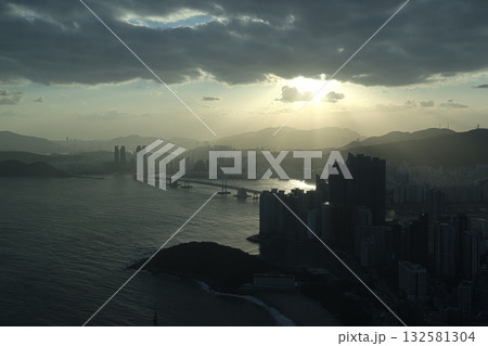 Busan city skyline and ocean at hazy sunset 132581304