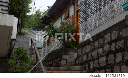 Bukchon Hanok Village alley rising traditional Korean houses Bukchon Hanok Village alley rising traditional Korean houses 132581719
