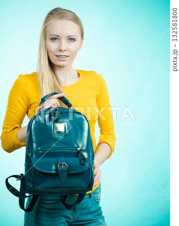 Teen girl with school backpack 132581800