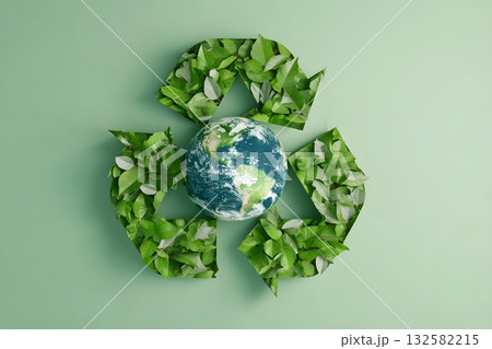 Green recycle symbol embraces the Earth with leaves. Green recycle symbol embraces the Earth with leaves. 132582215