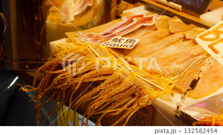 Dried squid tentacles and whole squid at street market in Seoul 132582454
