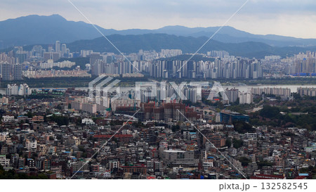 Seoul cityscape panorama showing Han River and mountains Seoul cityscape panorama showing Han River and mountains 132582545