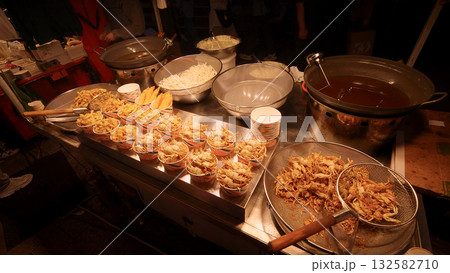 Seoul night market selling deep fried street food crabs Seoul night market selling deep fried street food crabs 132582710