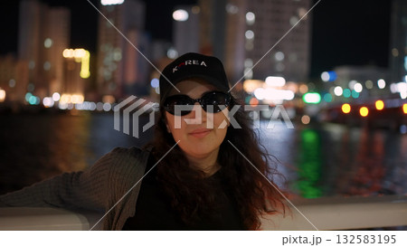 Woman posing at night in Busan South Korea Woman posing at night in Busan South Korea 132583195