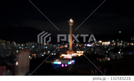 Busan Tower night cityscape with city lights bokeh Busan Tower night cityscape with city lights bokeh 132583228