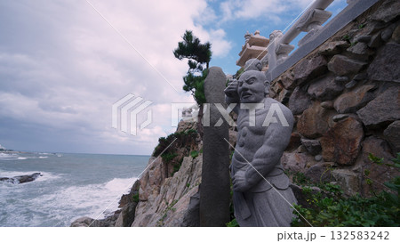 Buddhist stone sculpture at Haedong Yonggungsa Temple coastline Buddhist stone sculpture at Haedong Yonggungsa Temple coastline 132583242