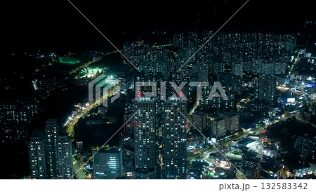 Busan city lights illuminating urban landscape at night 132583342