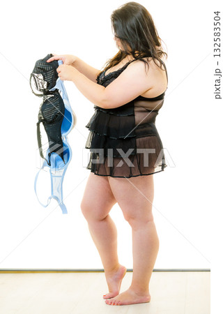 Plus size woman fitting bras 132583504