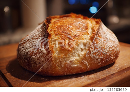 Rustic bread loaf sits ready for enjoyment. Rustic bread loaf sits ready for enjoyment. 132583689