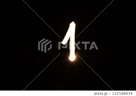 Way to success and leadership concept. Light painting number one entry in empty dark background. Labor Day, New Year, New Start. Way to success and leadership concept. Light painting number one entry in empty dark background. Labor Day, New Year, New Start. 132586634
