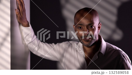Confident african american businessman posing in modern office Confident african american businessman posing in modern office 132589058